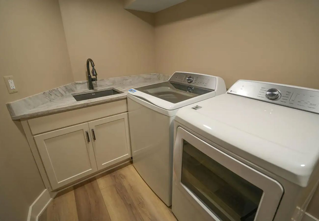 Washer and dryer with sink 