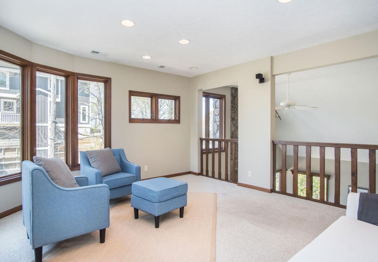 Upstairs living space with comfortable seating 