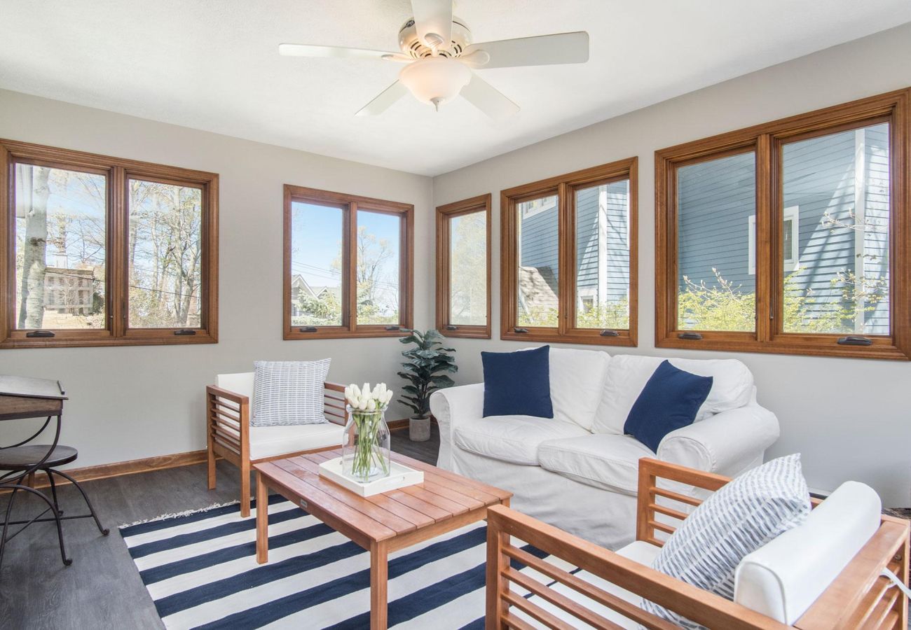 Porch with comfortable seating and Lake Michigan views 