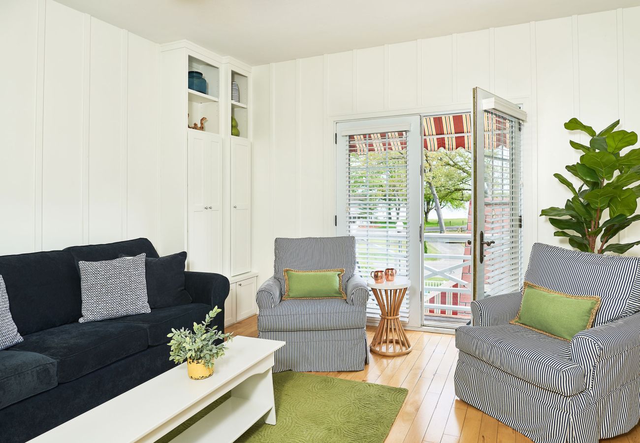 Comfortable living room with lake front views 