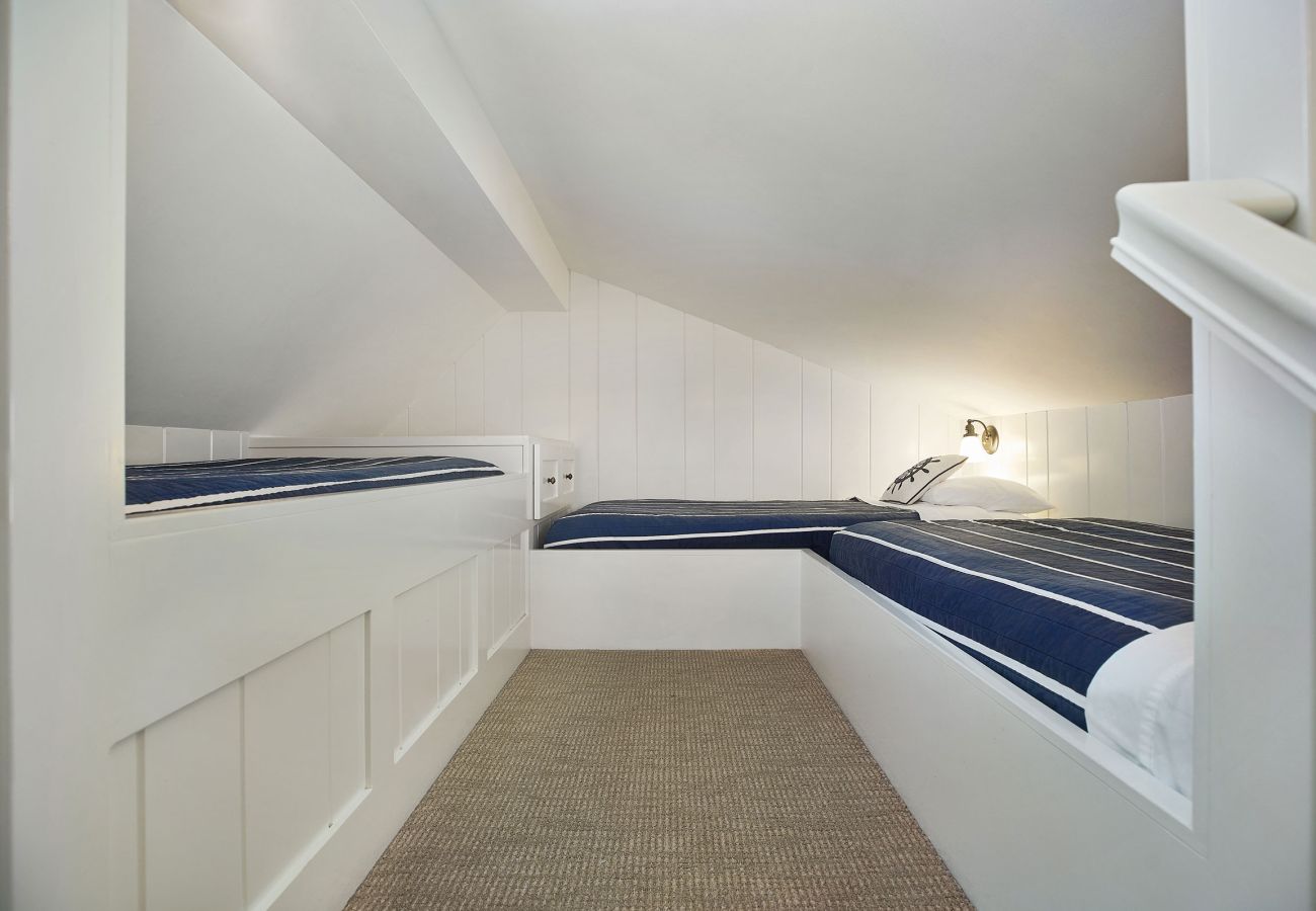 Three twin beds in loft