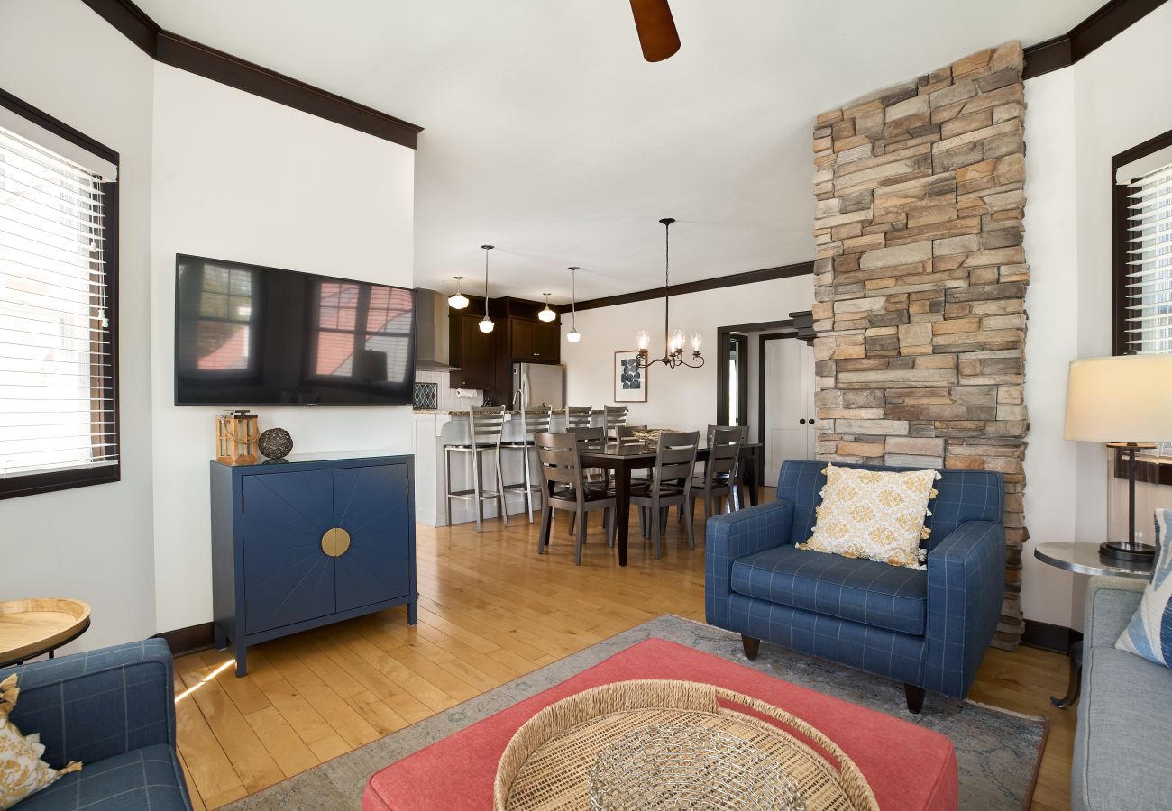 Second floor living room with comfortable seating and entertainment 