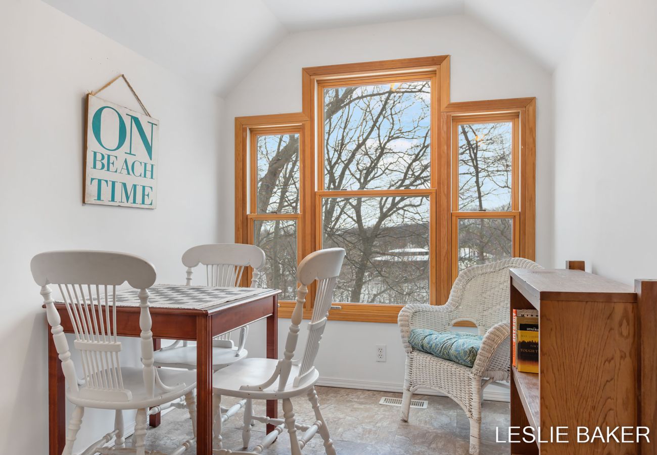 Third floor hangout space includes seating, chess board and lake views