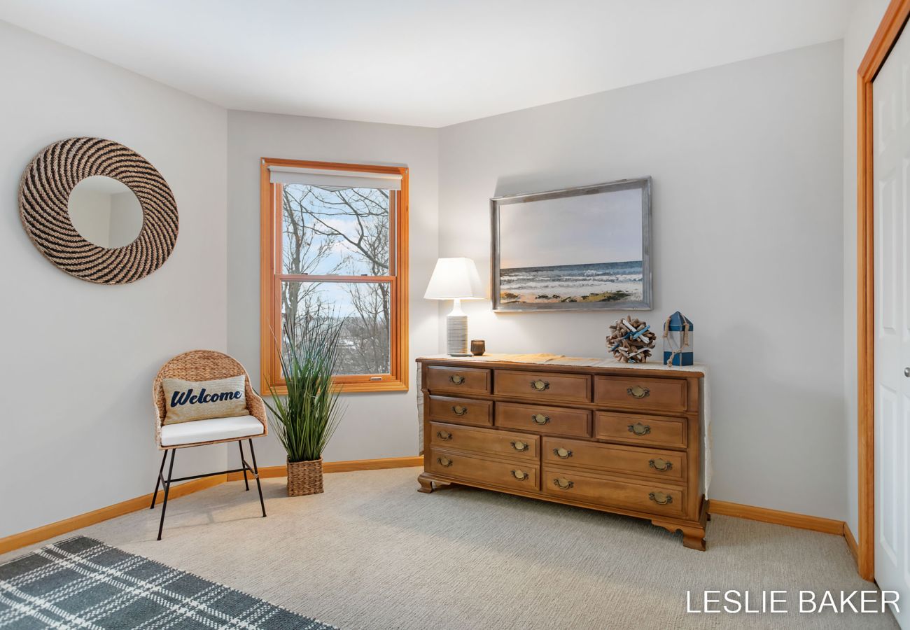 Dresser and chair in king bedroom on second floor