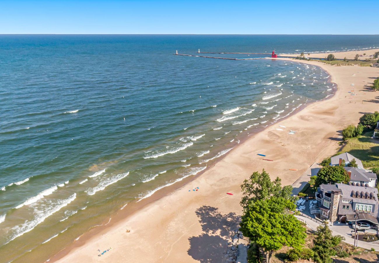 Drone image of Lake Michigan, including the pier, Big Red and the beach