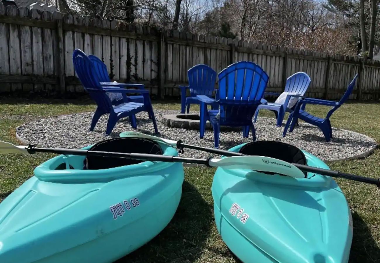 Fire pit and seating for 6. Kayaks are available for use as well.