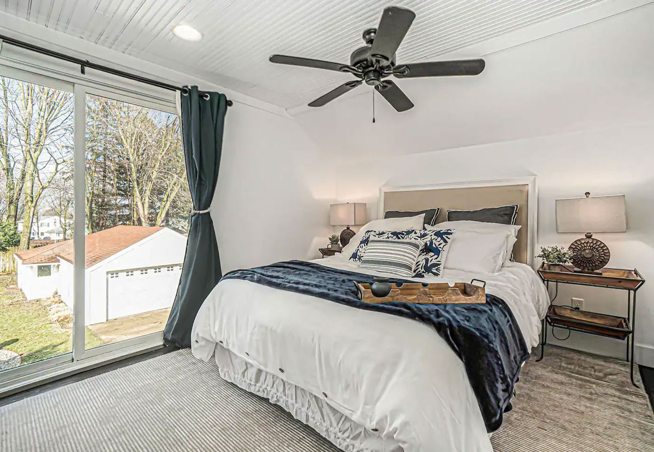 Primary bedroom on second floor with king bed