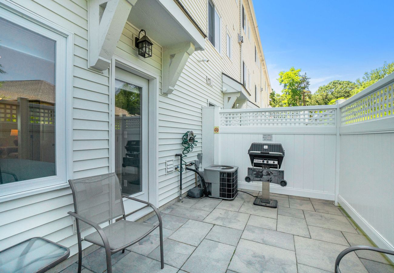 Outdoor grill and dining table plus additional seating